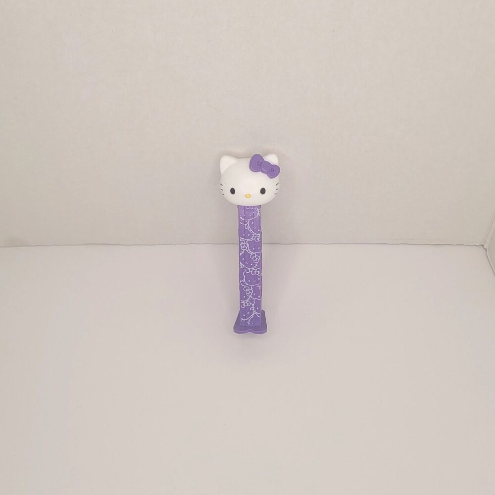 Rare 2025 Hello Kitty PEZ Dispenser Purple Bow Printed Art Stem Sanrio